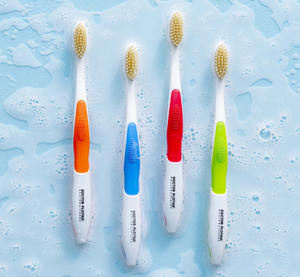 2 Adult Manual Toothbrushes and 2 Travel Toothbrushes